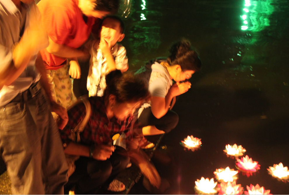 Blessing and putting river lanterns